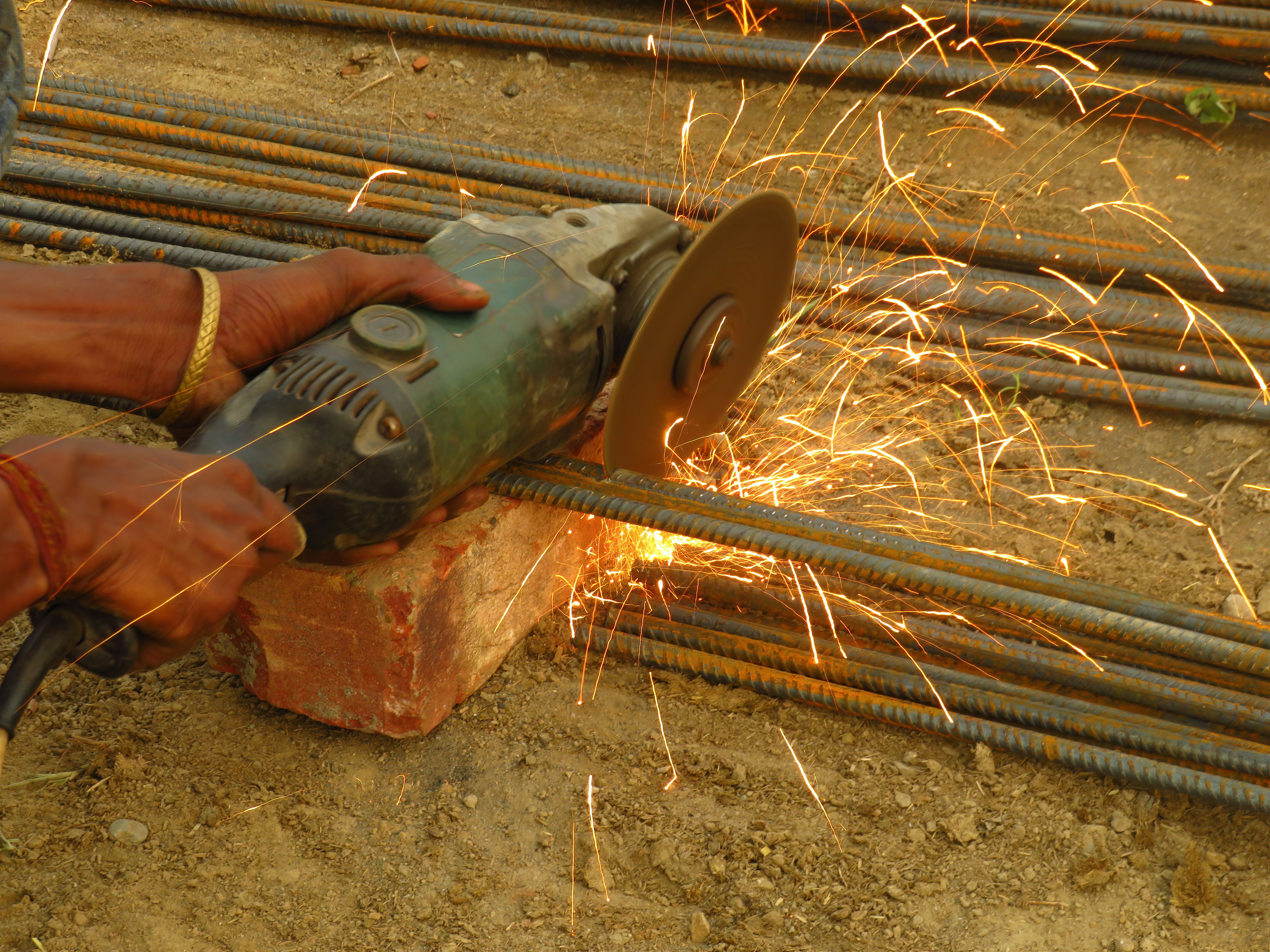 A welder using a shielded metal arc welder