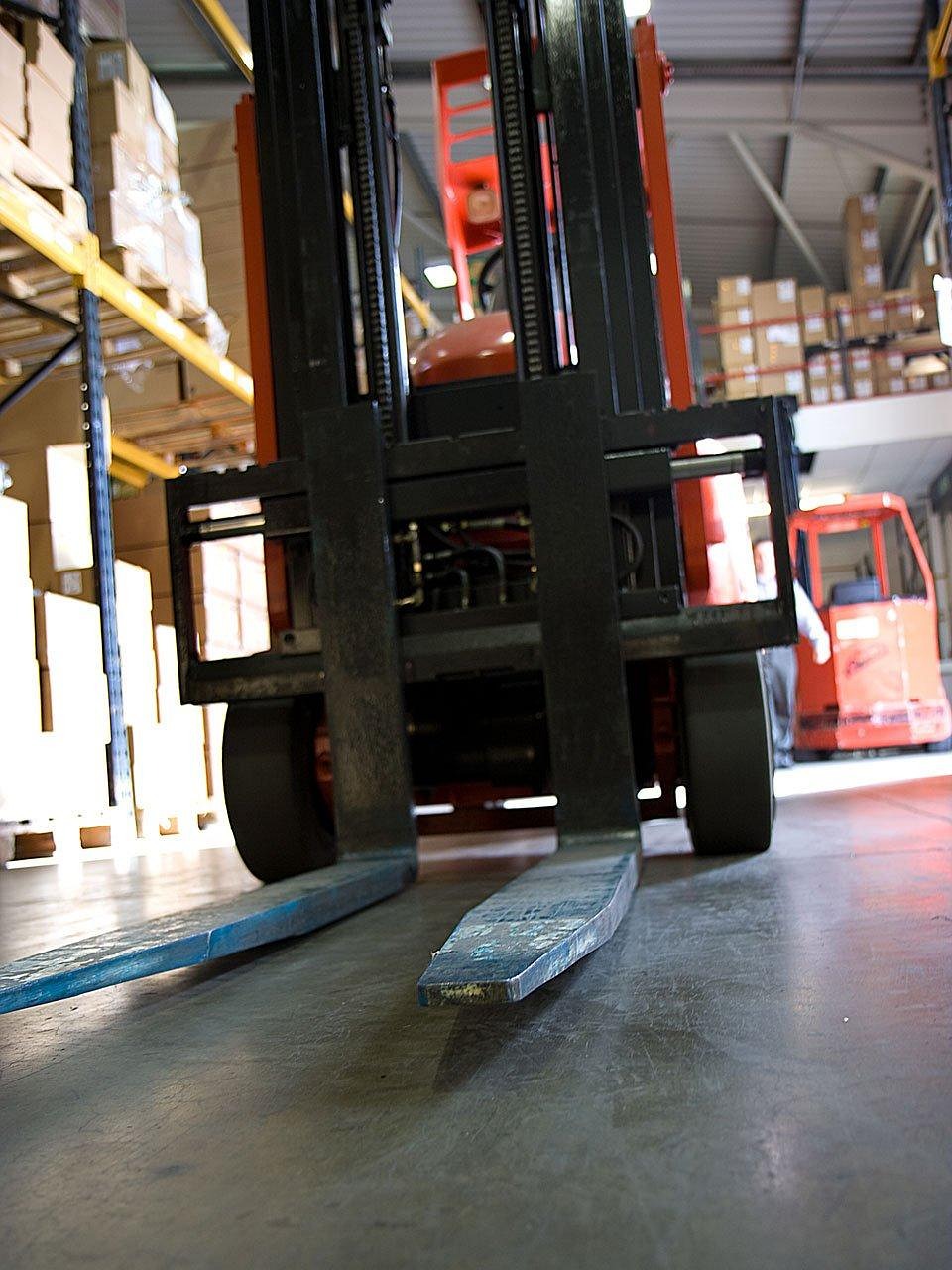 A student being trained on a forklift